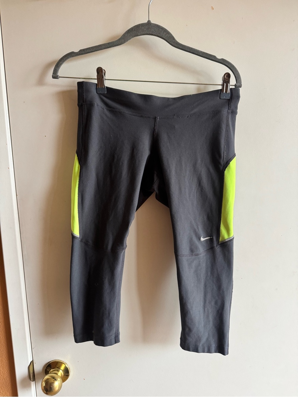 Nike GrayCapri Leggings with Neon Green Panels. Used Size M. Good condition